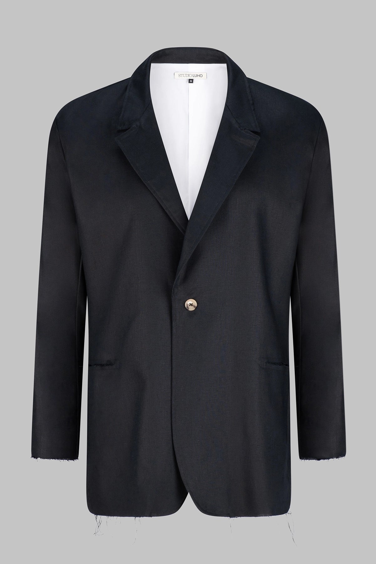 Front view of the Studio Luho deconstructed European linen blazer in black.