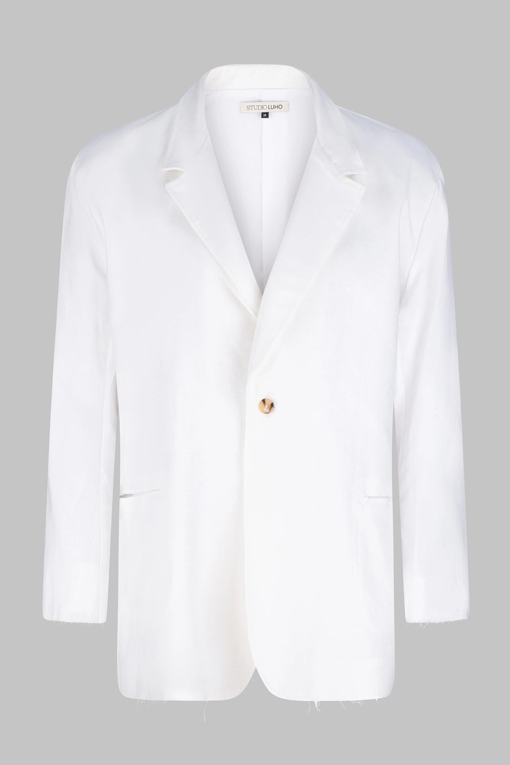 Front view of the Studio Luho deconstructed European linen blazer in white.
