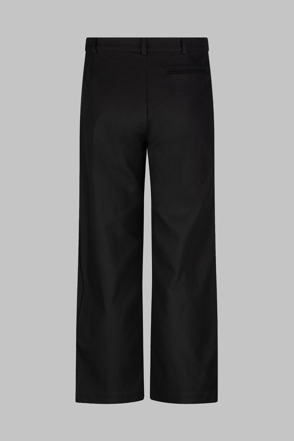 Back view of the Studio Luho relaxed fit pleated cotton trousers in black