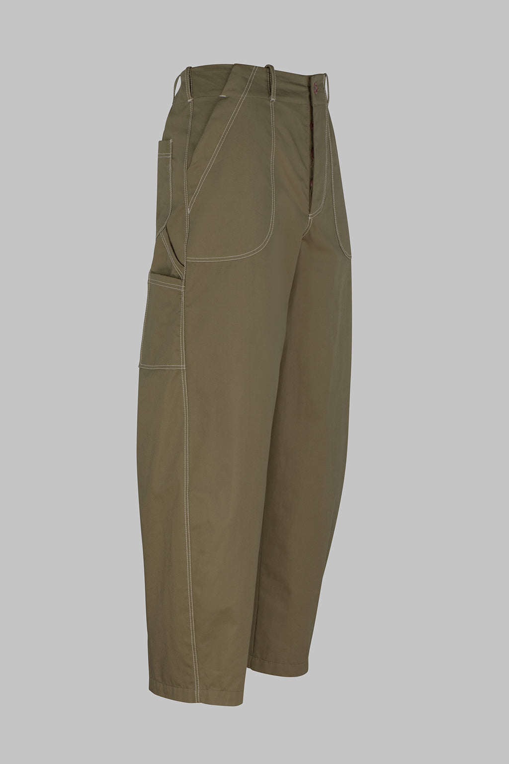 A pair of barrel leg fatigue trousers in olive green, featuring contrast light beige stitching and multiple utility pockets, shown against a solid gray background.