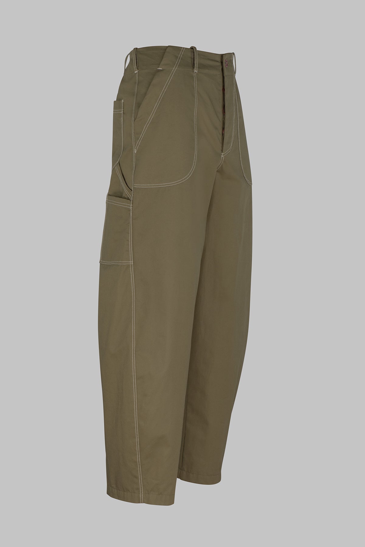 A pair of barrel leg fatigue trousers in olive green, featuring contrast light beige stitching and multiple utility pockets, shown against a solid gray background.