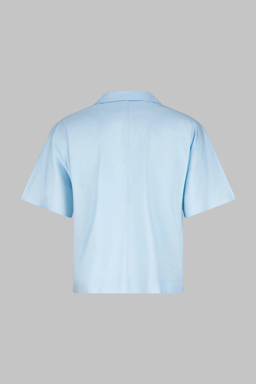 Back view of the Studio Luho short sleeve cotton work shirt in light blue, made in Melbourne.