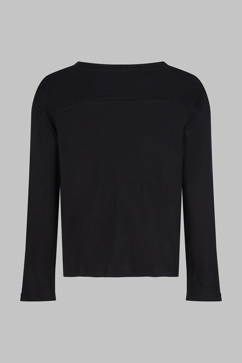 Back view of the Studio Luho organic cotton waffle knit long sleeve in sand.